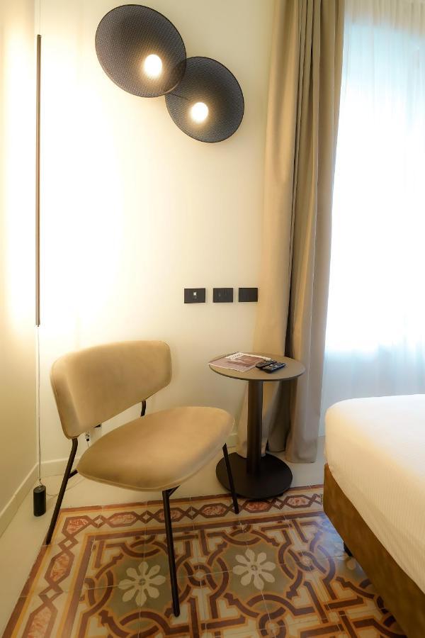 Bergamo INN 21 Exterior foto A room at the hotel