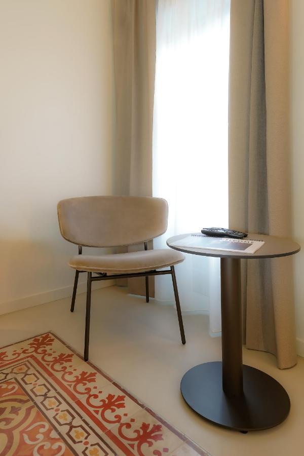 Bergamo INN 21 Exterior foto A chair
